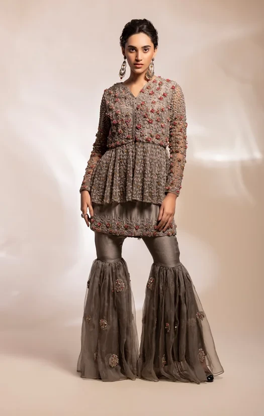 Grey peplum jacket, worn with Kurta tunic and gharara pants
